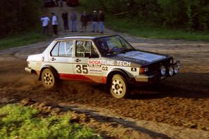 Eric Schroeder / Jennie Mynhier drift their VW Jetta through an uphill sweeper at the crossroads.