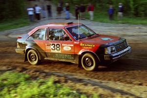 Jim Buchwitz / Charles Rudstrom in their Mercury Lynx head uphill at the crossroads.