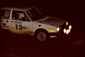 Wayne Prochaska / Annette Prochaska drive through the crossroads at night in their VW Golf.