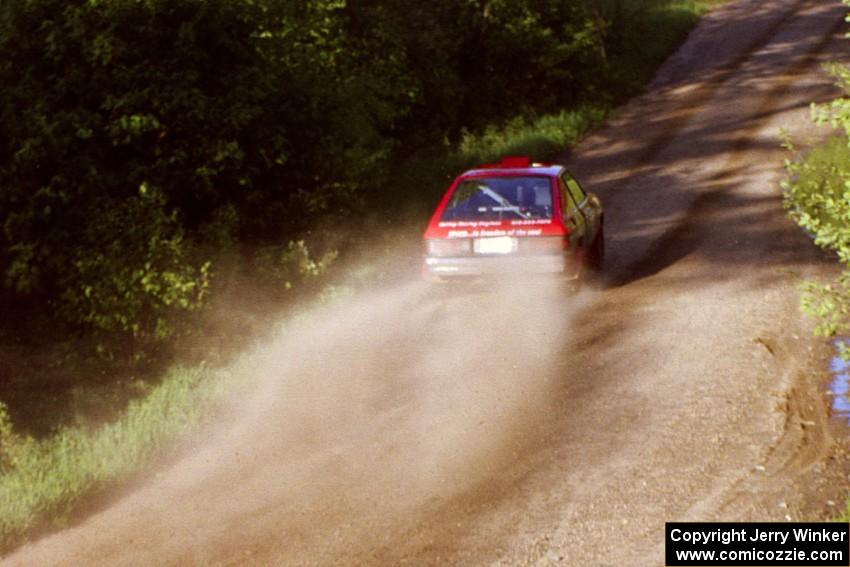 Mark Utecht / Paul Schwerin make two huge rooster-tails after getting light at the crossroads in their Dodge Charger.