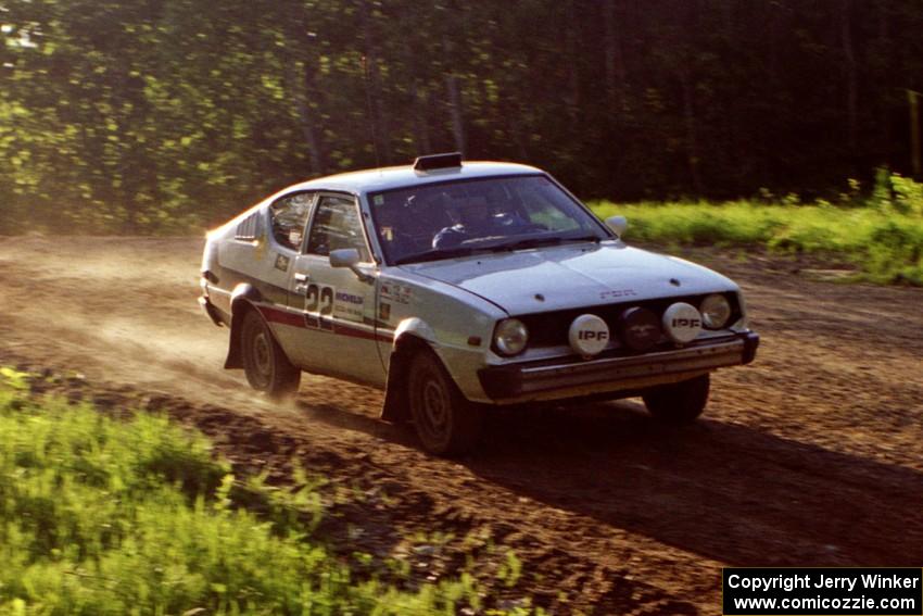 Jeremy Butts / Peter Jacobs at speed in their Plymouth Arrow at the crossroads crest.