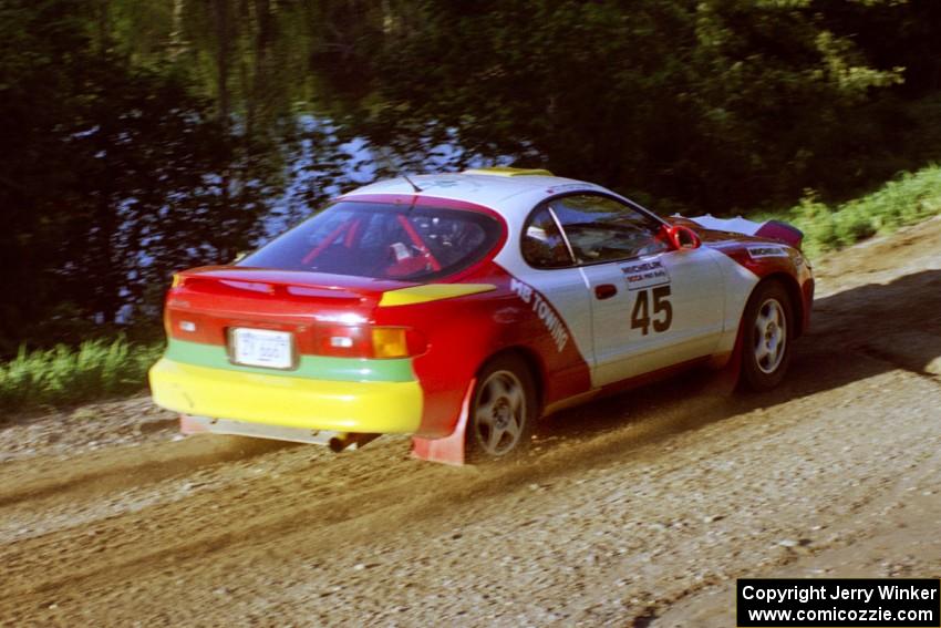 Miroslaw Babinski / Piotr Modrzejewski at speed just beyond the crossroads in their Toyota Celica All-trac.