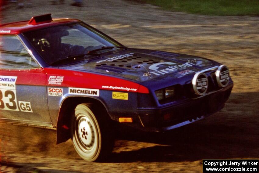 Mark Utecht / Paul Schwerin head through an uphill sweeper at the crossroads in their Dodge Charger.