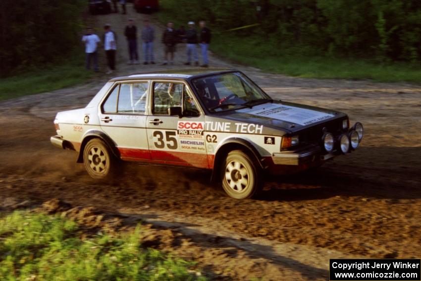 Eric Schroeder / Jennie Mynhier drift their VW Jetta through an uphill sweeper at the crossroads.