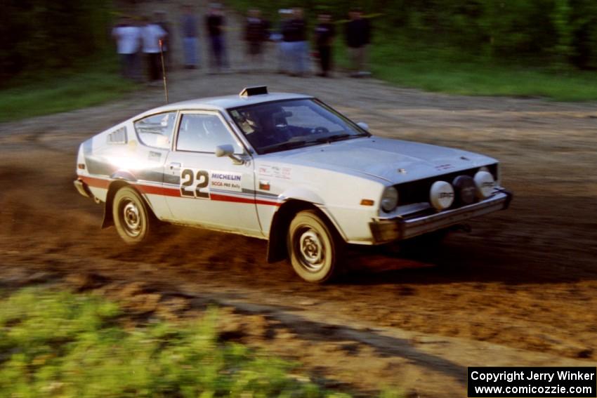 Jeremy Butts / Peter Jacobs head uphill in their Plymouth Arrow at the crossroads.