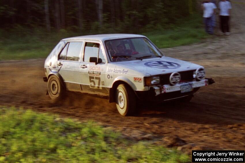 Damien Crane / John Adams-Graf drift through the crossroads uphill sweeper in their VW Rabbit.