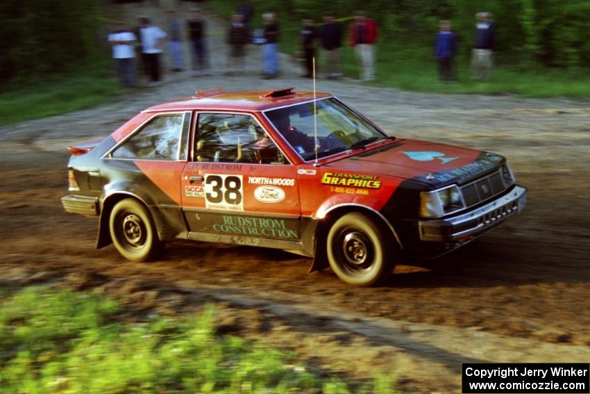 Jim Buchwitz / Charles Rudstrom in their Mercury Lynx head uphill at the crossroads.