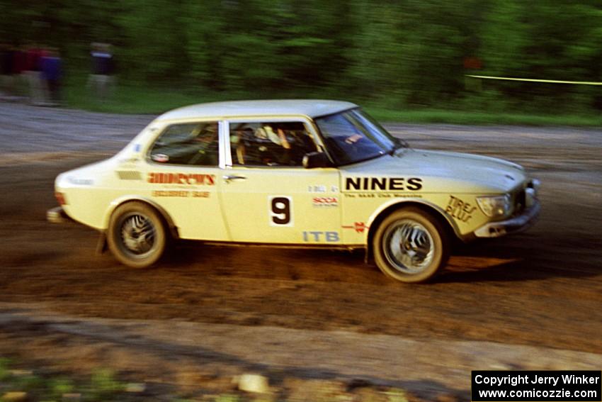 Mike Winker / Doug Dill take an uphill sweeper in their SAAB 99 at the crossroads spectator location.