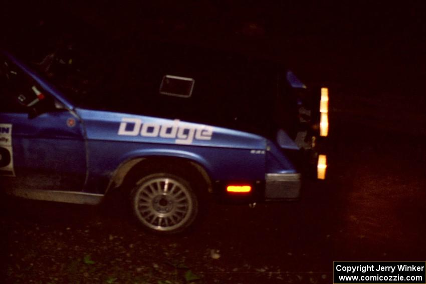 Brian Scott / David Watts drive through the crossroads at speed in their Dodge Shelby Charger.