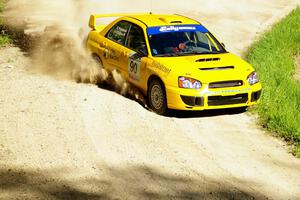 In preparation for STPR, Lauchlin O'Sullivan / Scott Putnam wrung out their Subaru WRX STi seen here at a sweeper on SS1.