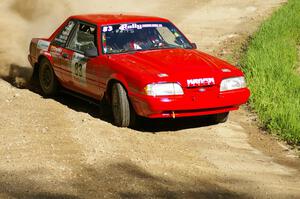 Mark Utecht / Rob Bohn Ford Mustang drifts through a sweeper on SS1.