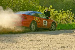 Doug Davenport snaps a shot of the Steve Gingras / Nick Johannes Mitsubishi Eclipse at a 90-left on SS2.