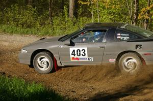 Erick Nelson / Greg Messler power through a left-hander on SS2 in their Mitsubishi Eclipse.