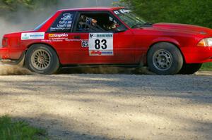 Mark Utecht / Rob Bohn set up for a hairpin left on SS3 in their Ford Mustang.