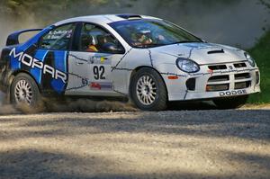 Paul Dunn / Kim DeMotte set up their Dodge SRT-4 for a left-hand hairpin on SS3.