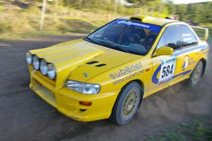 Al Kintigh / Heidi Meyers Subaru Impreza at speed through a hard-right on SS4 after losing time from an off on SS3.