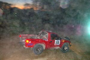Jim Cox / Scott Parrott drive carefully through the dust at a downhill right on SS5 in their Chevy S-10.