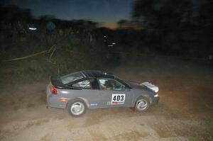 Erick Nelson / Greg Messler set up for a downhill right on SS5 in their Mitsubishi Eclipse.