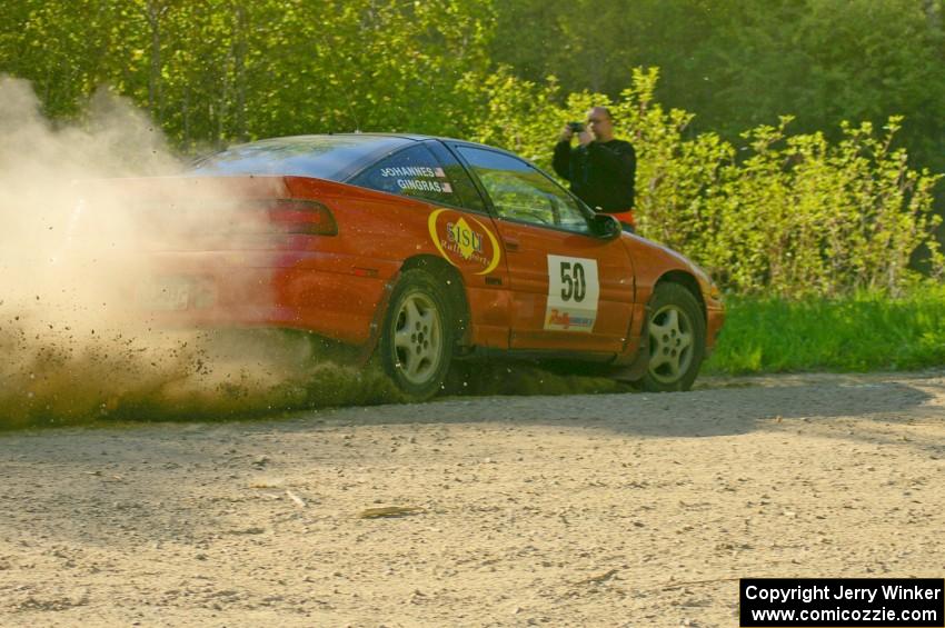 Doug Davenport snaps a shot of the Steve Gingras / Nick Johannes Mitsubishi Eclipse at a 90-left on SS2.