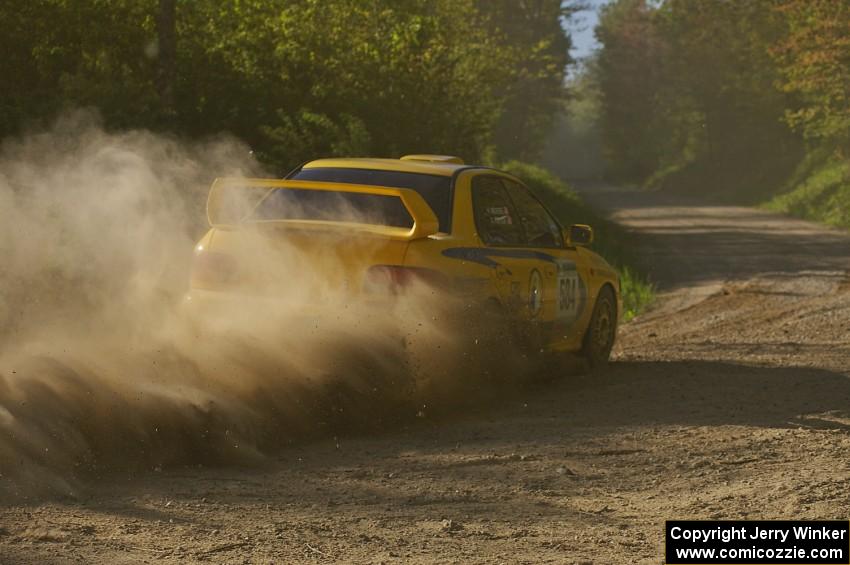 Al Kintigh / Heidi Meyers Subaru Impreza at speed through a 90-left on SS2.