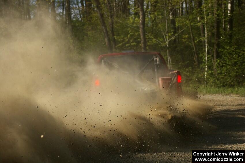 Jim Cox / Scott Parrott throw a spray of gravel skyward on SS2 in their Chevy S-10.