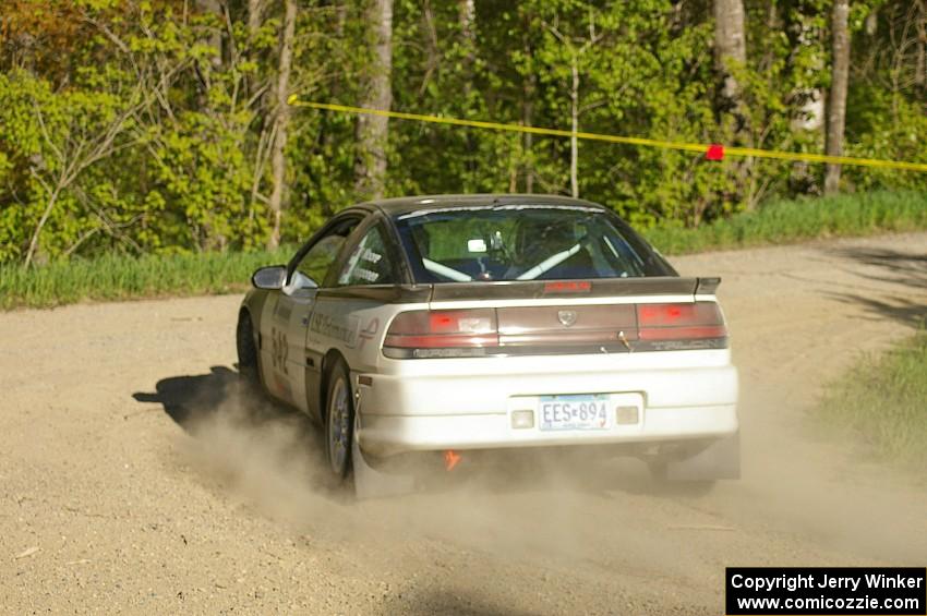 Dan Moore / John Hopponen pull their Eagle Talon off the road on SS2.