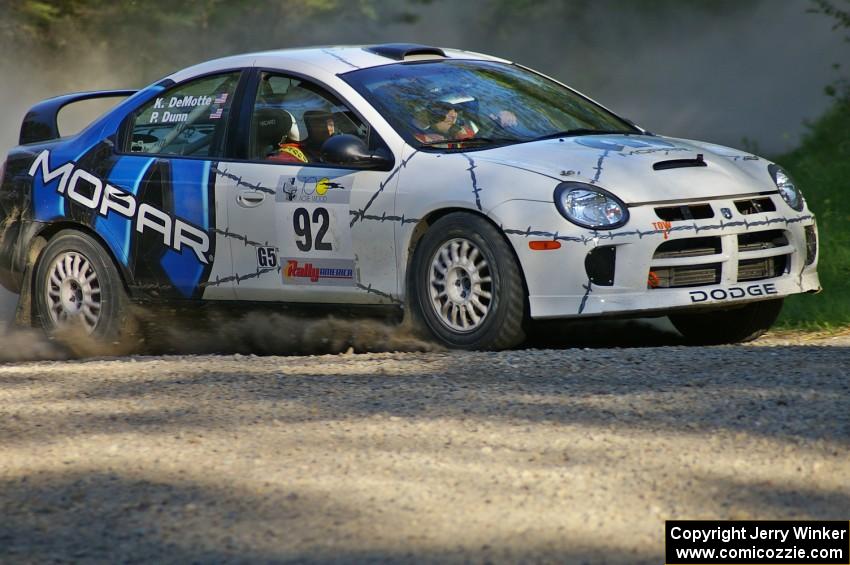 Paul Dunn / Kim DeMotte set up their Dodge SRT-4 for a left-hand hairpin on SS3.