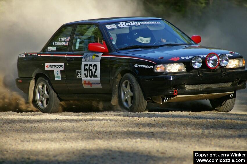 Brian Dondlinger / Dave Parps set up for a hairpin left on SS3 in their Nissan Sentra SE-R.