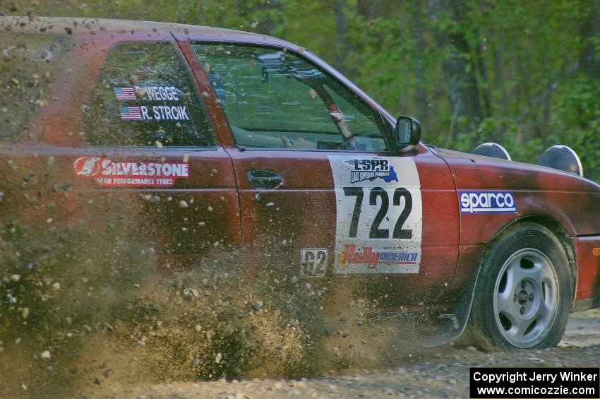 Rob Stroik / Ross Wegge spray gravel at hairpin left on SS3 in their Nissan Sentra SE-R.