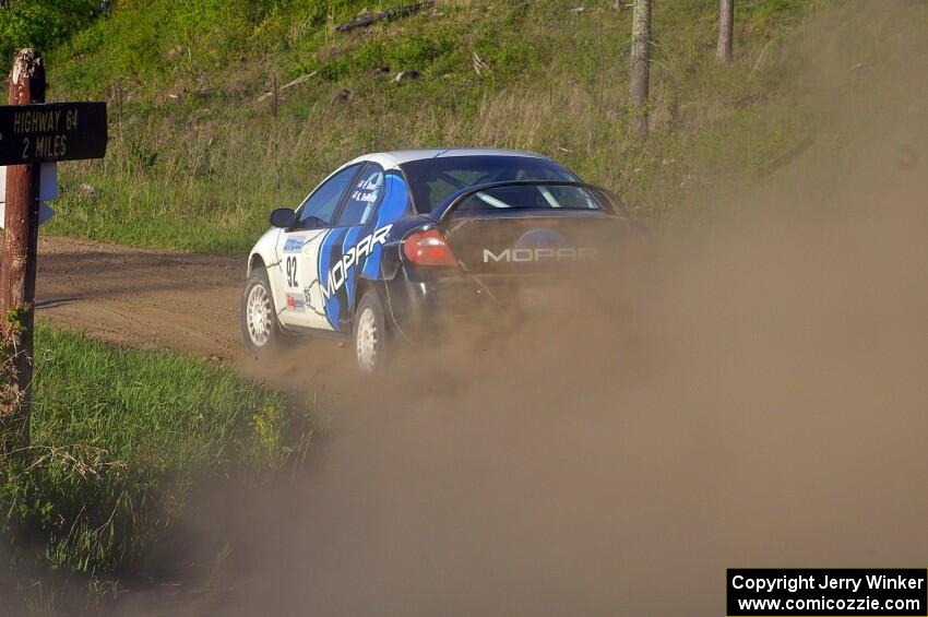 Paul Dunn / Kim DeMotte accelerate out of a left-hander on SS4 in their Dodge SRT-4.