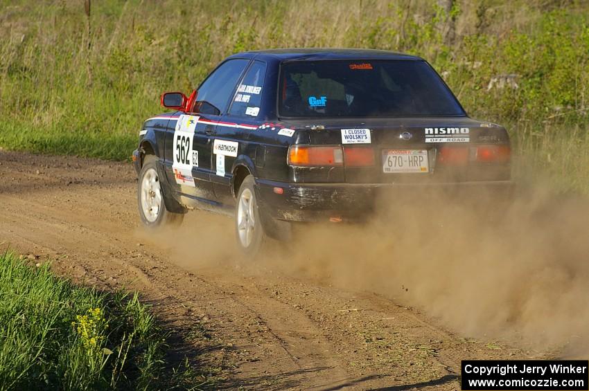 Brian Dondlinger / Dave Parps drift out of a 90-left on SS4 in their Nissan Sentra SE-R.