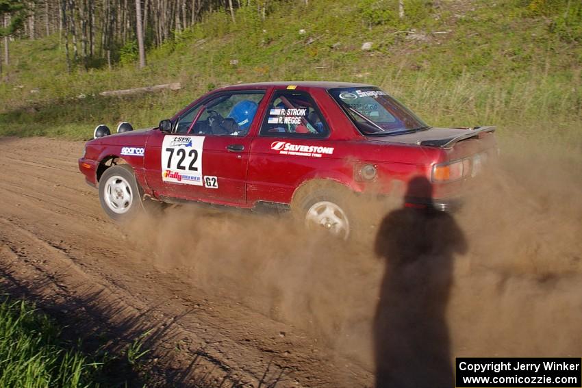 Robert Stroik / Ross Wegge drift out of a 90-left on SS4 in their Nissan Sentra SE-R.