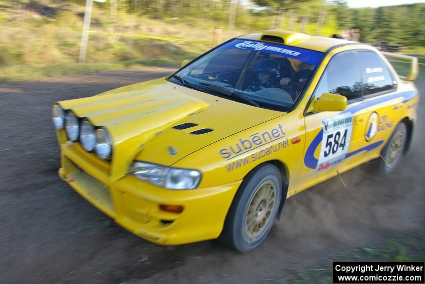Al Kintigh / Heidi Meyers Subaru Impreza at speed through a hard-right on SS4 after losing time from an off on SS3.