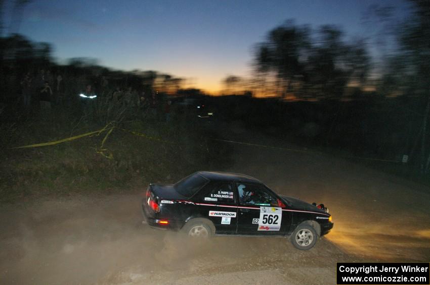 Brian Dondlinger / Dave Parps at a dowhill right spectator point on SS5 in their Nissan Sentra SE-R.