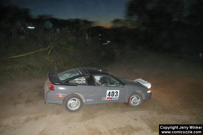 Erick Nelson / Greg Messler set up for a downhill right on SS5 in their Mitsubishi Eclipse.