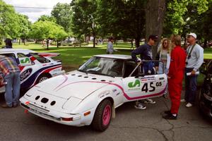 Craig Kazmierczak / Diane Sargent Mazda RX-7 at the green before the rally.