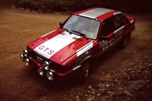 Sylvester Stepniewski / Adam Pelc Audi 4000 Quattro at a 90-left on SS7, Wilson Run I.