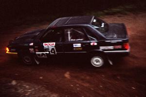 Mike Burke / Tony Lumino Audi 4000 Quattro at a 90-left on SS7, Wilson Run I.