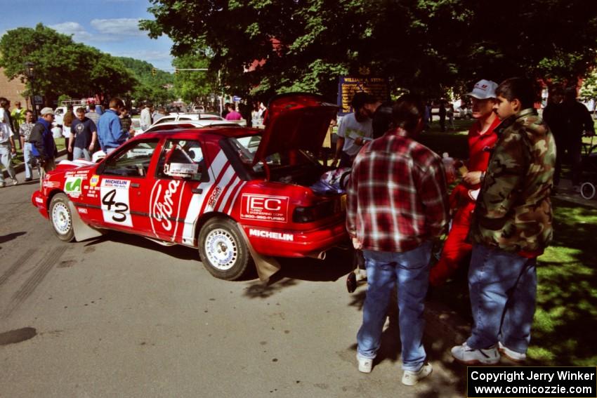 Mike Whitman / Paula Gibeault Ford Sierra Cosworth at the green during the midday break