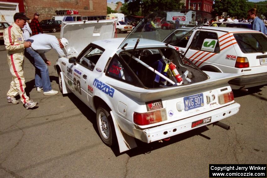 Ted Grzelak / Chris Plante Mazda RX-7 at the green during the midday break