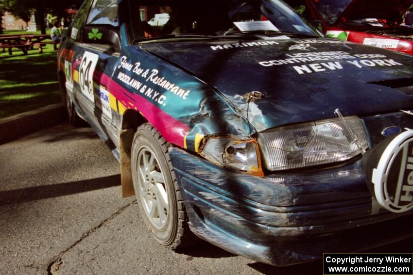 Padraig Purcell / Michael O'Sullivan Ford Escort GT sports some fresh damage