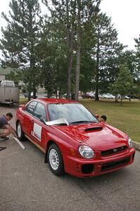 Dave Anton / Dominik Jozwiak Subaru WRX had a fresh coat of red paint after their crash at Maine Forest Rally.