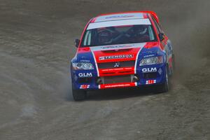 Alfredo DeDominicis / Massimo Daddovei come through the last corner of SS1 at Bemidji Speedway in the Mitsubishi Lancer Evo VII.