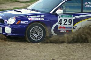 Tanner Foust / Chrissie Beavis Subaru WRX flings rocks on the Bemidji Speedway Super Special, SS1.