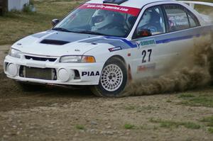 Chris Gilligan / Joe Petersen Mitsubishi Lancer Evo IV in the infield of SS1 at the Bemidji Speedway.