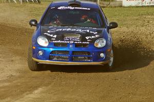 Cary Kendall / Scott Friberg throw gravel on SS1 at the Bemidji Speedway in their Dodge SRT-4.