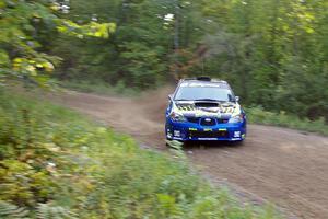 Ken Block / Alex Gelsomino Subaru Impreza WRX STi at speed on the final corner of SS2.