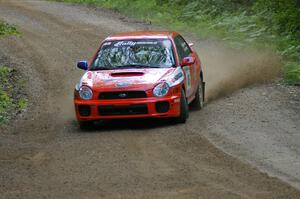 Matthew Johnson / Kim DeMotte Subaru WRX sets up for a left-hander near the end of SS2.