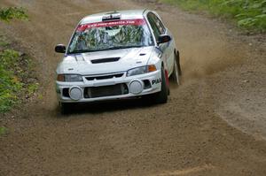 Chris Gilligan / Joe Petersen set up for a left-hander on SS2 in their Mitsubishi Lancer Evo IV.