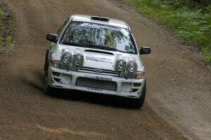 Henry Krolikowski / Cindy Krolikowski prepare for a fast left-hander on SS2 in their Subaru WRX.